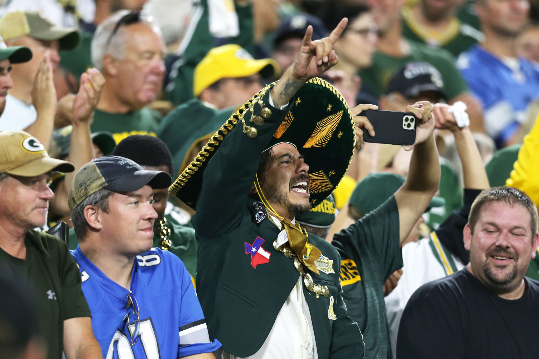 Packers vs. Lions fans, State Journal photo